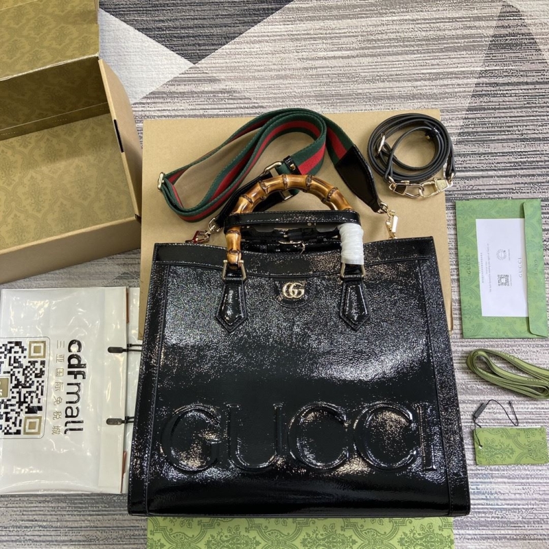 G*u*i top handle bags